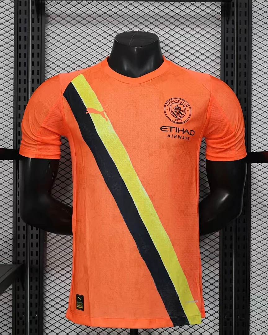 Camisola Manchester City 25/26 Laranja Versão Jogador